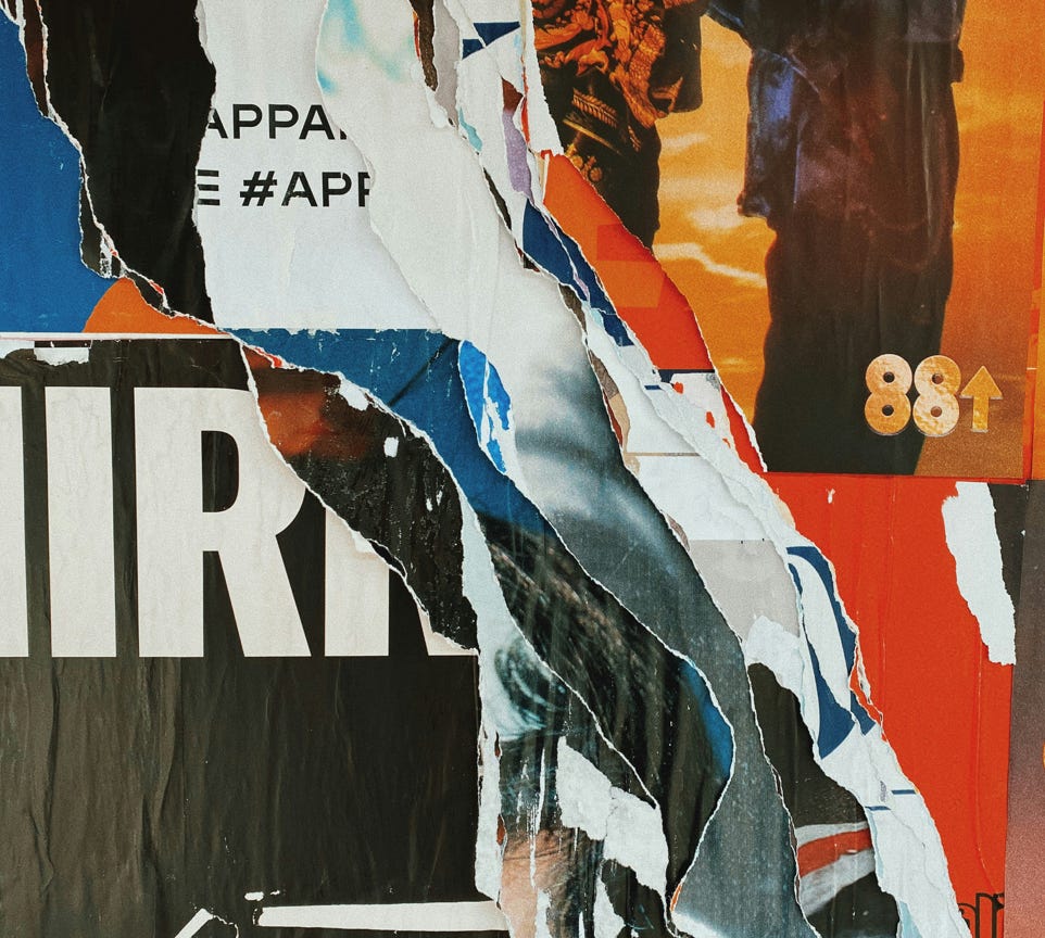An African American woman ironing on a forest road, blending nature with household tasks.